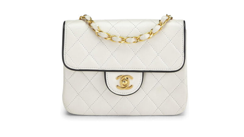 CHANEL Pre-Loved White Quilted Lambskin Piped Half Flap